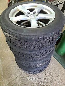Set of 4 Bridgestone Blizzak DM-V2 235/60R18 Tires on Mag Wheels