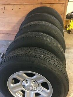 Set of 5 GOOD YEAR WRANGLER Tires P225/75R16 on Jeep Wrangler Silver Wheels-Rims