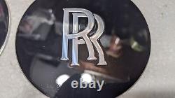 En français, le titre serait: Enjoliveur de moyeu de pièce de Rolls Royce avec petit logo central RR - Set de 4.